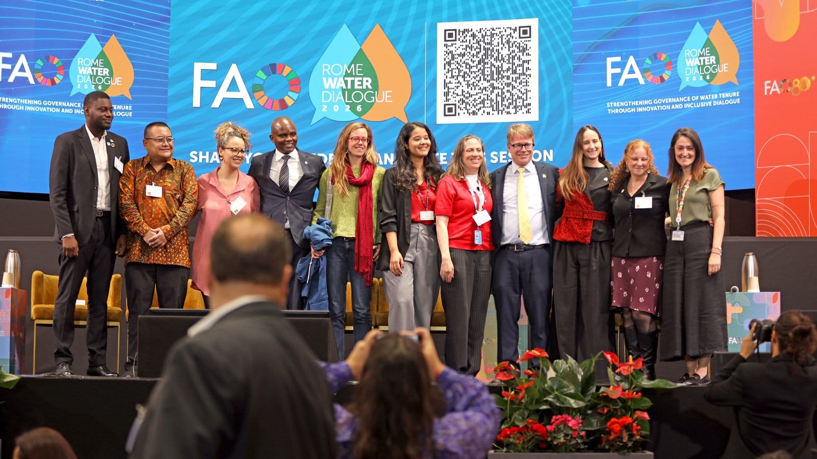 Speakers and organisers of the water tenure session on stage at FAO headquarters