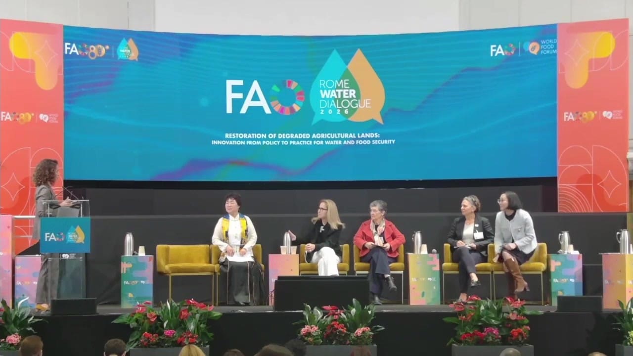 The technical panel on restoration of degraded agricultural lands seated on stage in FAO's Red Room