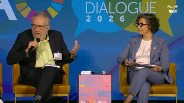 Pedro Arrojo Agudo speaking into a microphone on the stakeholder panel